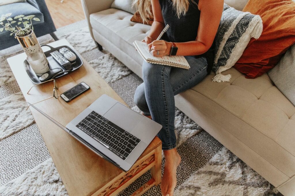 woman writing out a diet plan